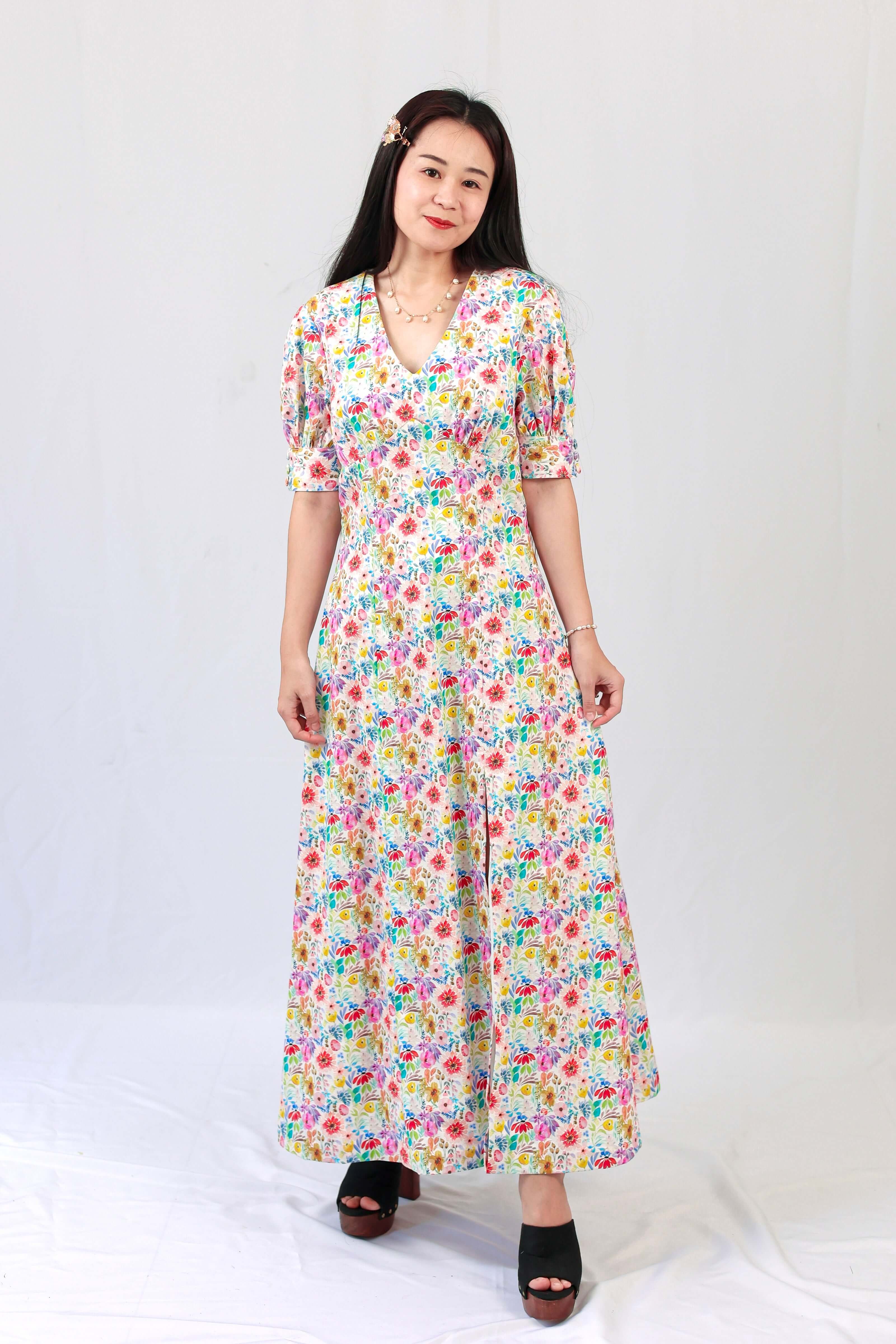 Crafted from premium 100% cotton, the dreamy Teresa dress exudes ultra-feminine charm. It boasts a gracefully voluminous skirt, short puffed sleeves, and delicate button closures. Adorned with pearl or floral buttons at the back for added elegance.