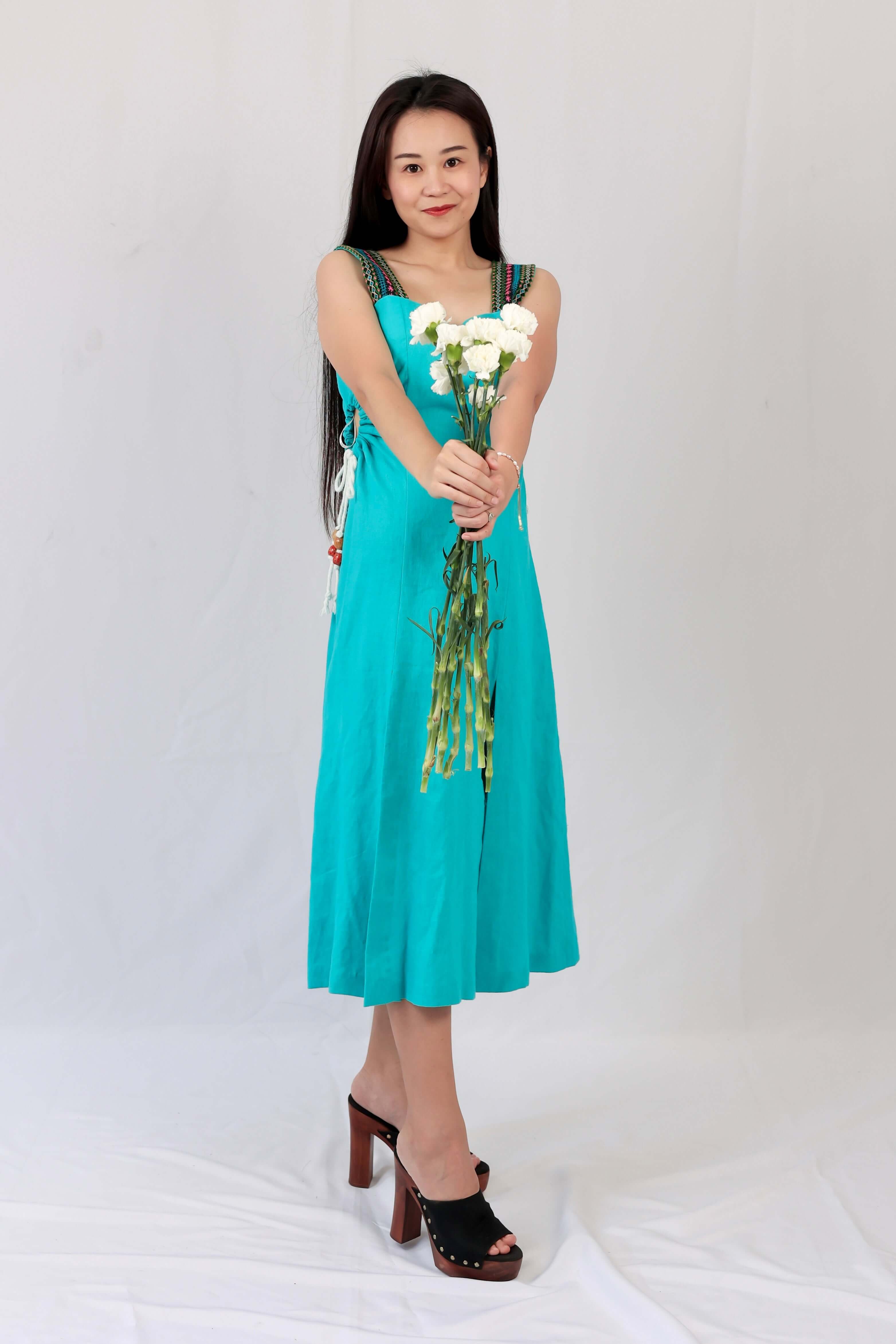 The Sonja dress, crafted from premium hemp, is ultra-feminine and captivating. Perfect for casual events or a date, it features a cut-out side design with a drawstring for adjustable fit. Complete with a sweetheart neckline, hand-embroidered details, and a thigh-high split for graceful movement.